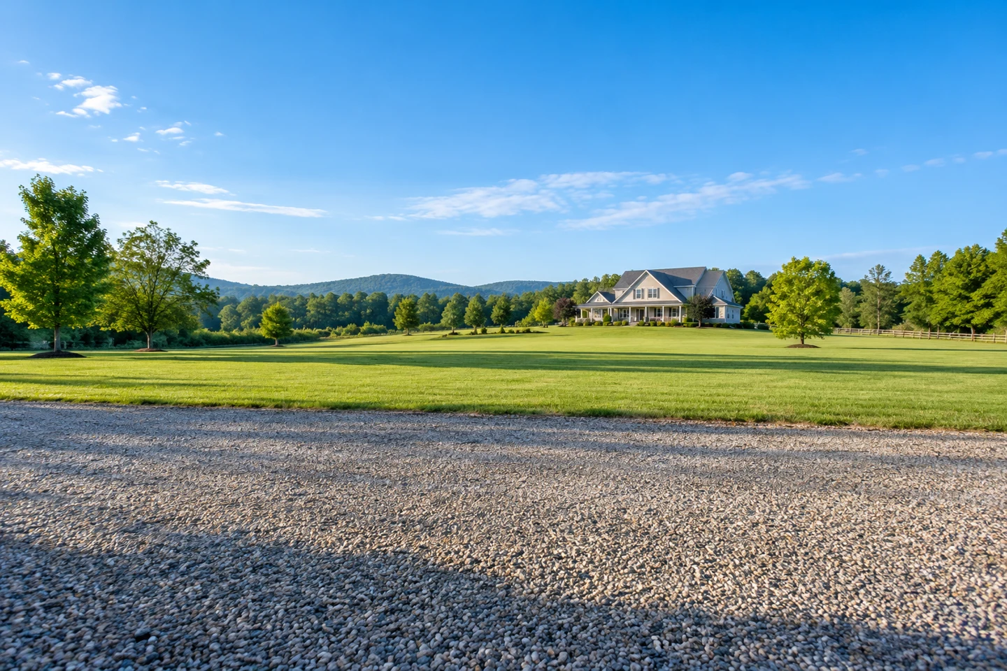 Illustrative open yard with a home far in the distance